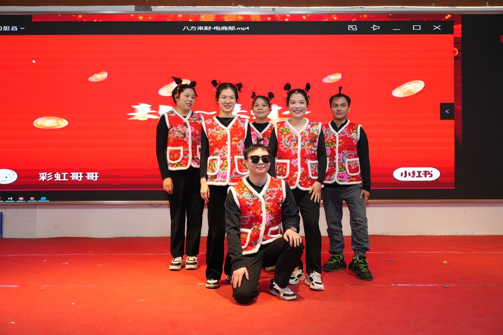 BURTONO colleagues smiling together after a team performance