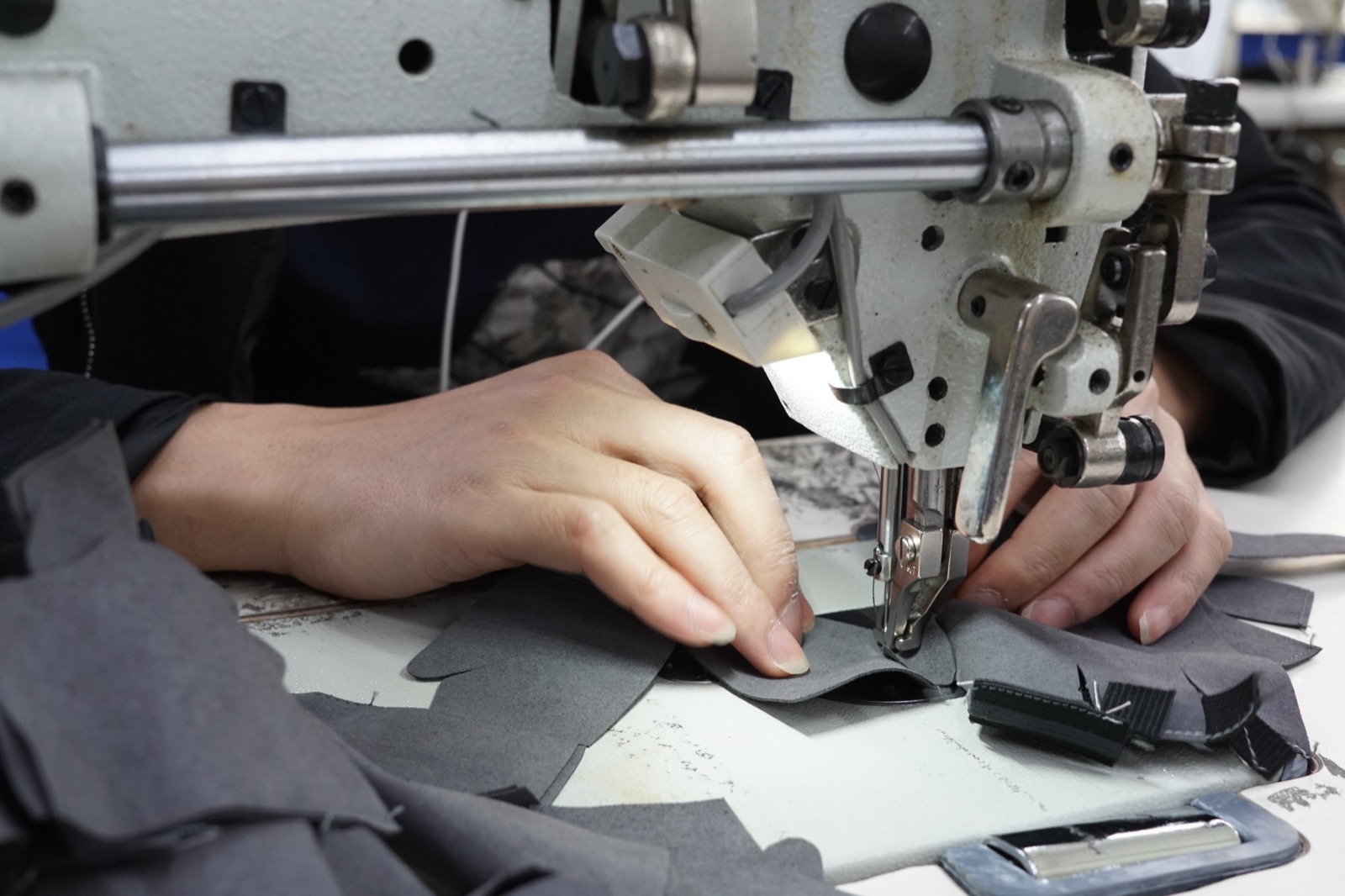 Close-up of sports glove stitching and glove panel construction